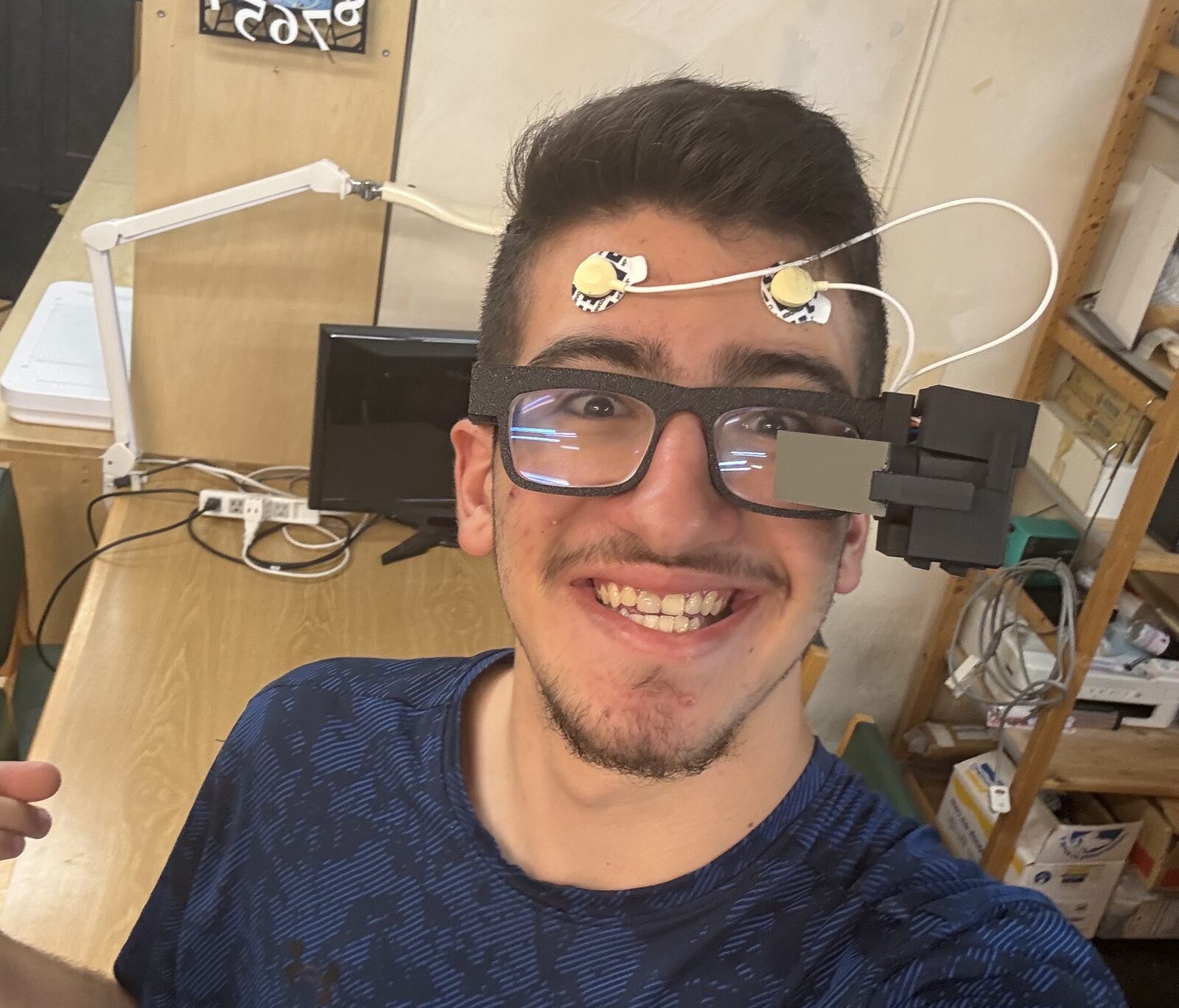 Wearable prototype with forehead electrodes and the side-mounted AR display assembly