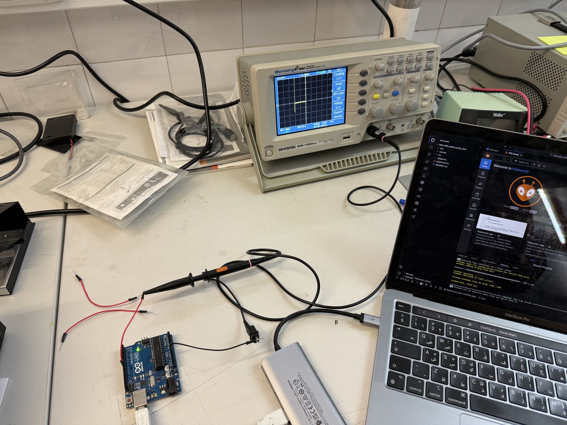 Full bench setup with oscilloscope and laptop