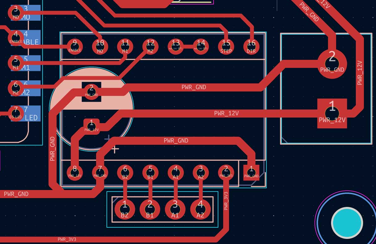 The through hole components are flipped when tracing the path. The capacitor is placed such that it is close to the power and ground in the motor driver. The capacitor is bent and soldered to the backside of the PCB.