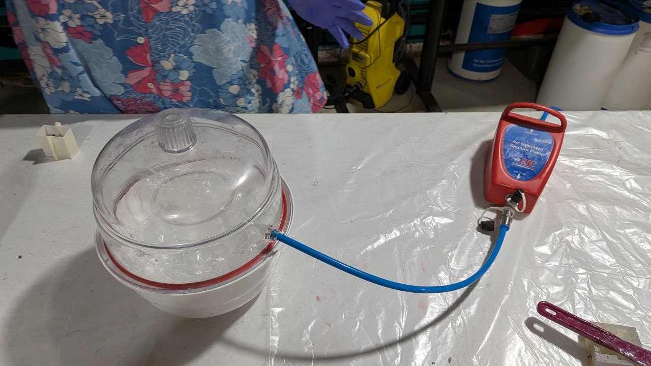 Keep the mixture in the vacuum chamber. This pulls out the trapped air bubbles. Wait for the silicone to rise and fall, then the bubbles are gone.