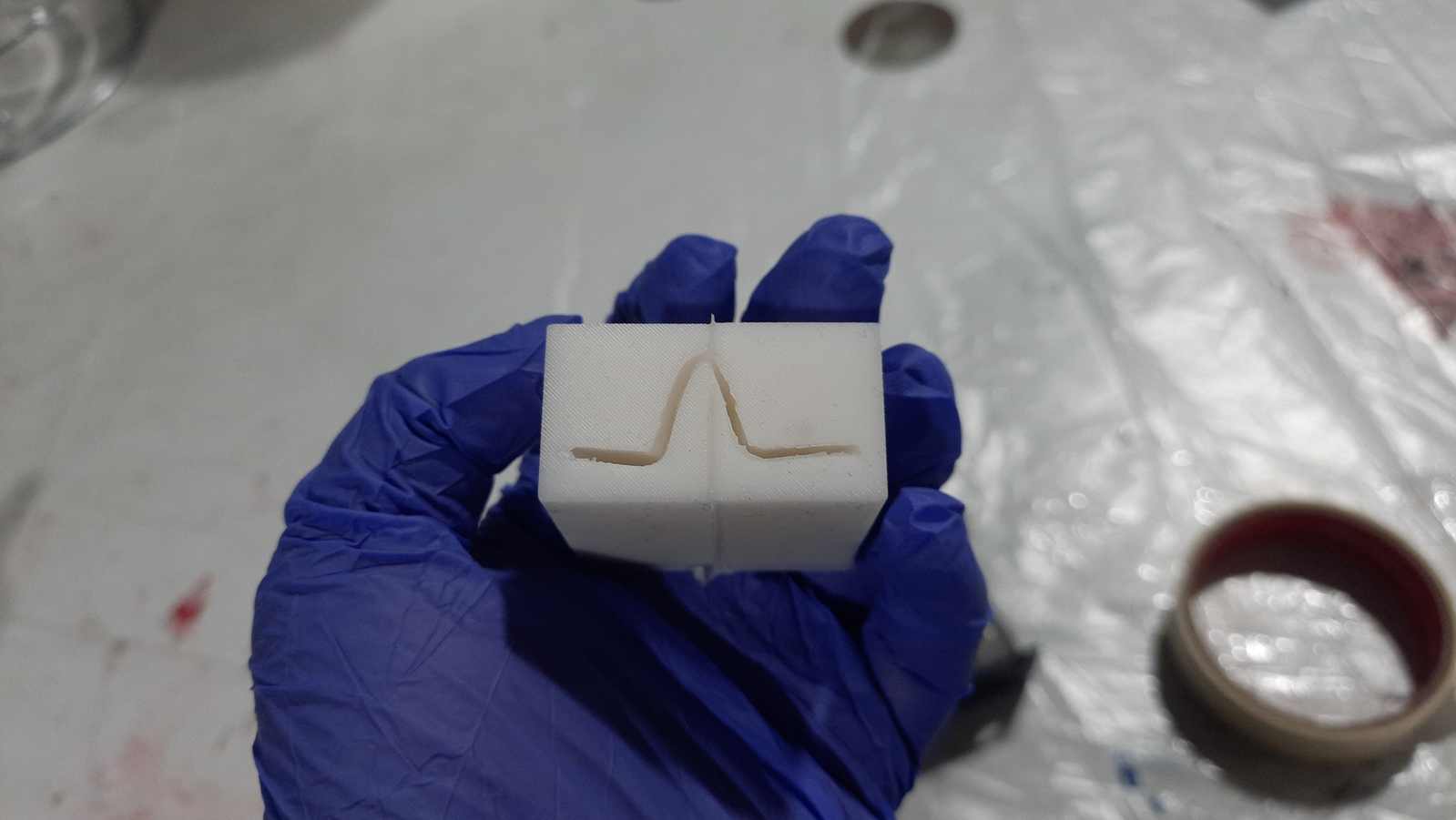 I removed the excess silicone layer with a handy cutter and scissors.