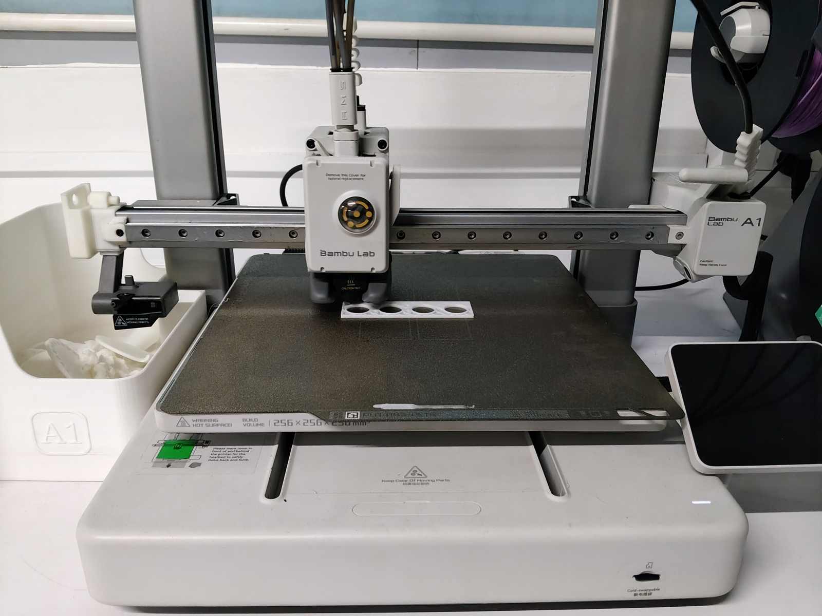 The fitment jig being 3D printed to test shaft tolerances and ensure an accurate fit for the motor shaft.