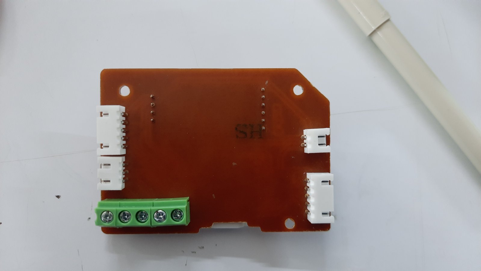 Back view of the PCB where most of the connectors are mounted. This side contains the wiring connections used to interface with the other boards and modules.