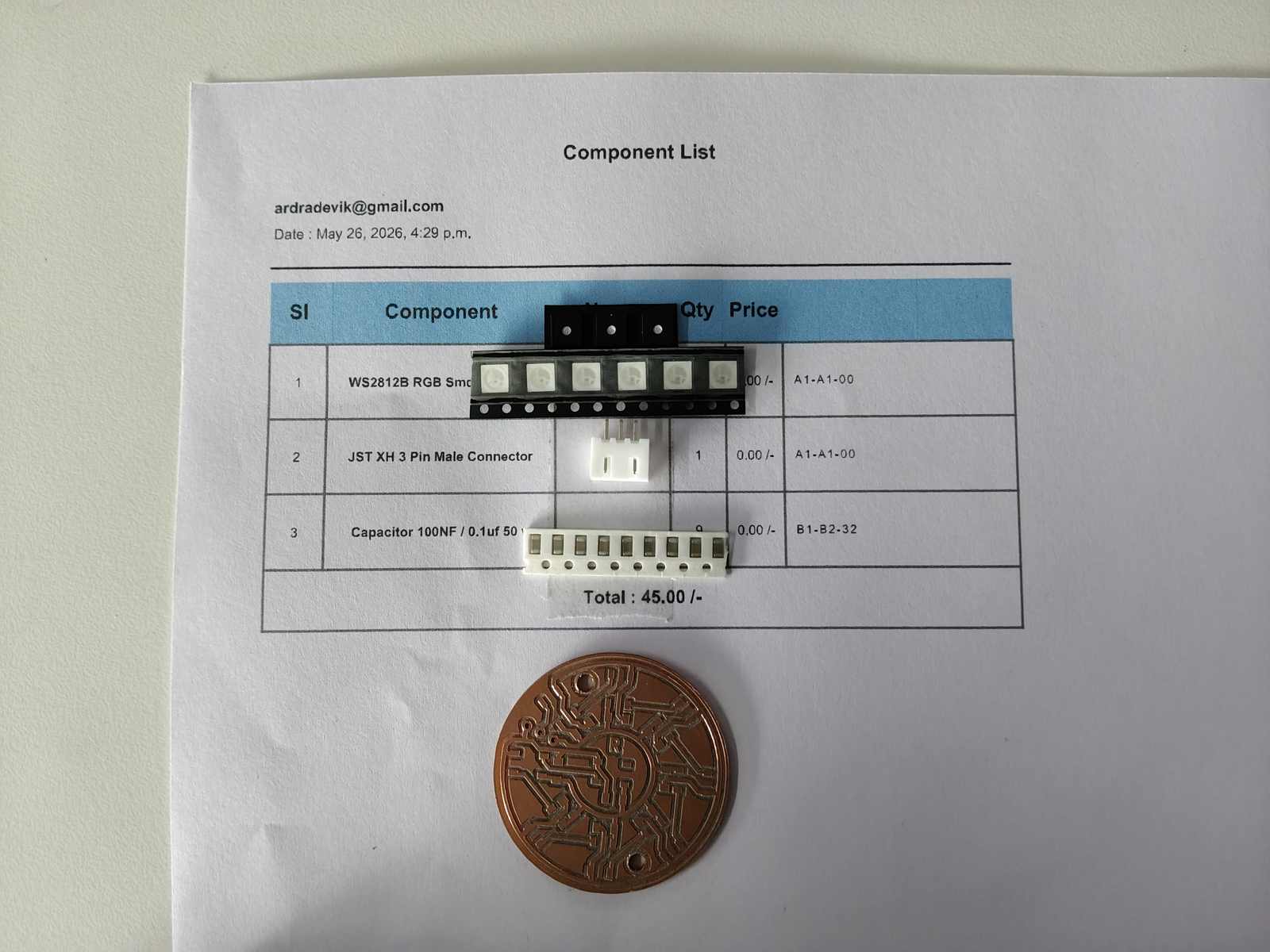 Components used on the NeoPixel ring PCB. These include WS2812B RGB SMD LEDs, JST XH 3 pin connectors, and capacitors used to stabilise the power supply for the LEDs.