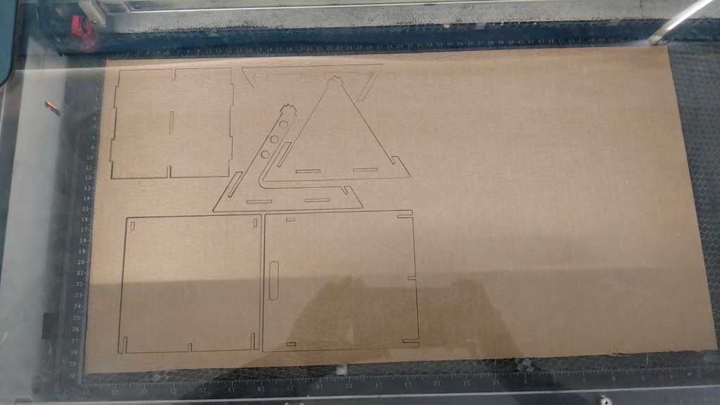 The model was scaled down and cut using a laser cutter.