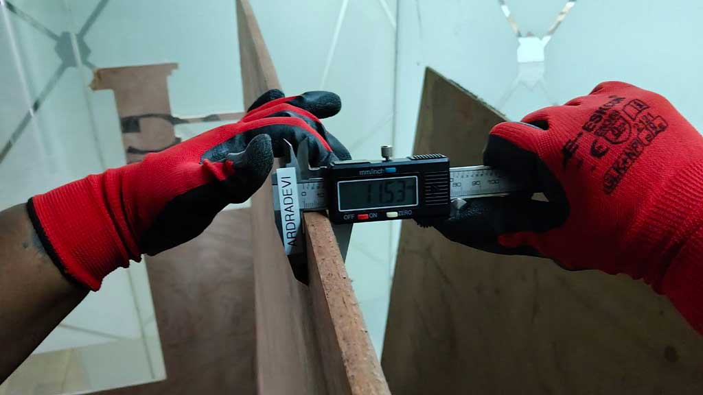 The plywood's thickness was measured at different points.