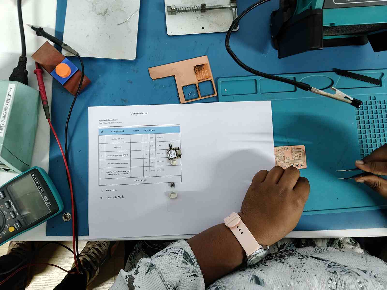 Using double sided tape on paper to organize and hold components