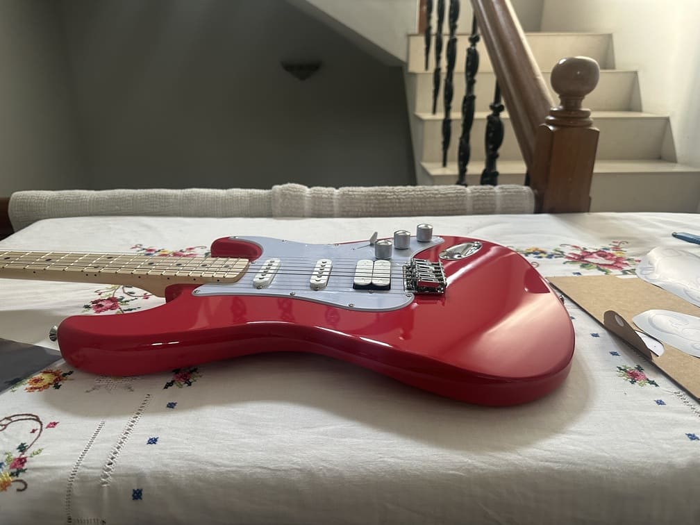 Cleaning the guitar surface before vinyl application