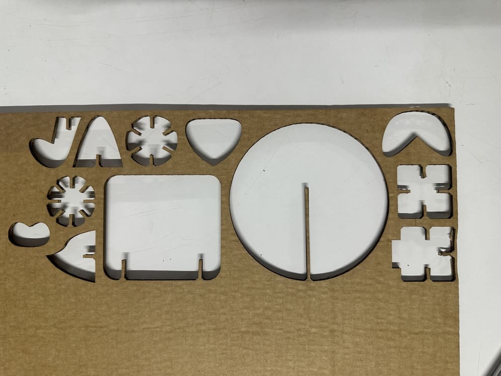 Clean laser cut cardboard pieces