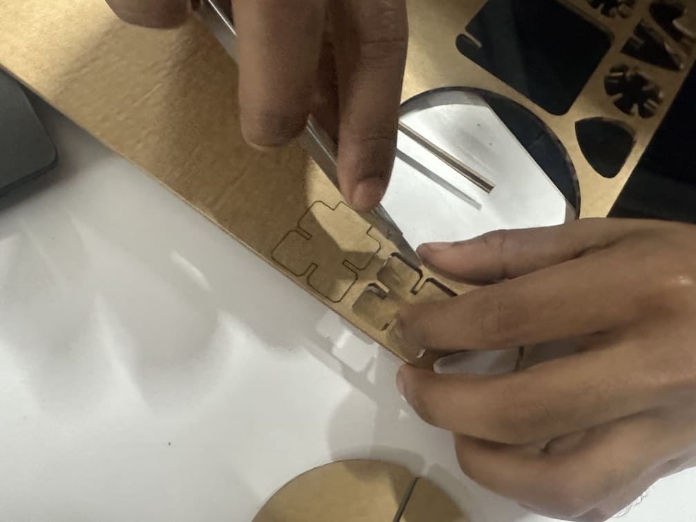 Manual trimming of partially cut pieces