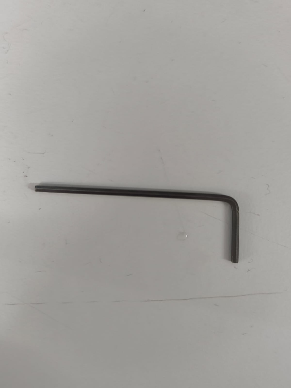 L-shaped hex Allen key used to loosen and tighten the spindle collet when changing bits