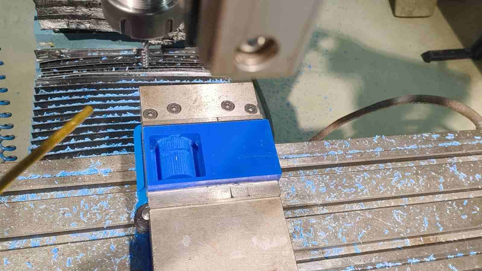 Completed wax mold after CNC machining, showing the cavity carved into the wax block