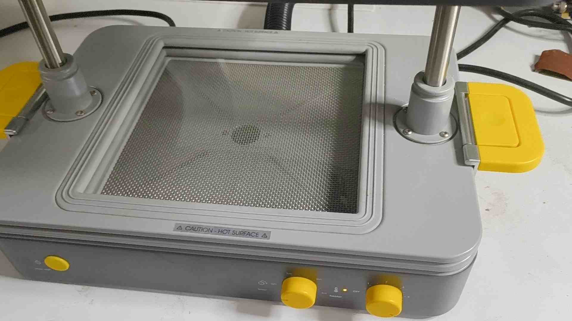 Sheet clamped in frame