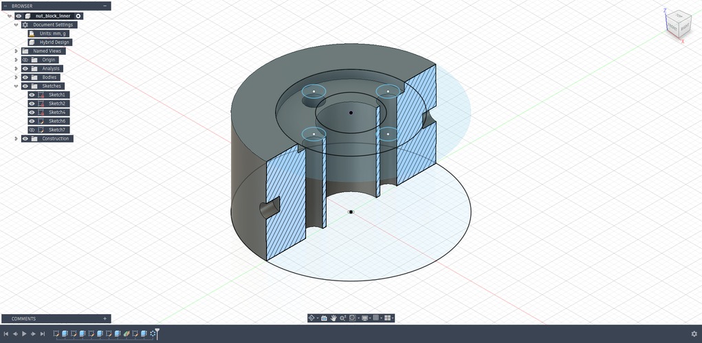Section view in Fusion 360 of the nut_block_inner part, showing the pocket for the brass nut, the central bore and four M3 holes.