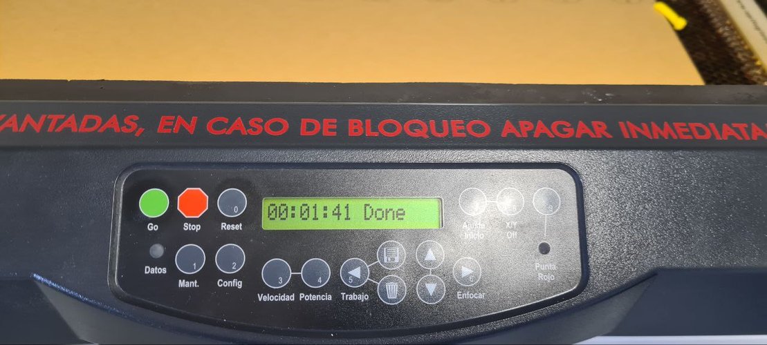Epilog control panel showing the job finished, reading Done.