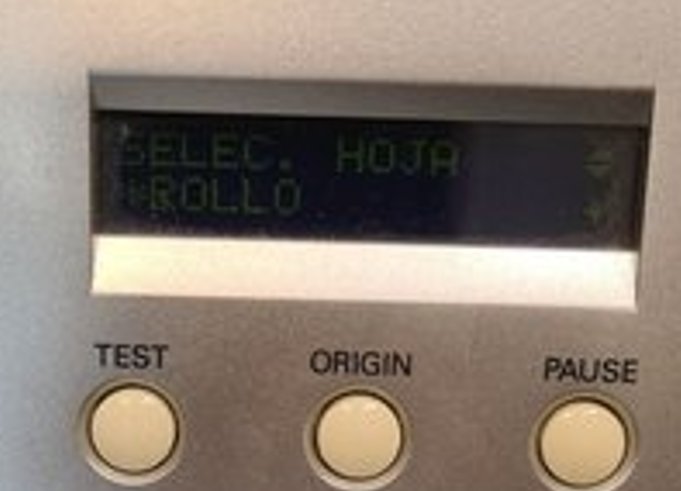 Roland GX-24 LCD showing the sheet/roll selection menu set to ROLLO.