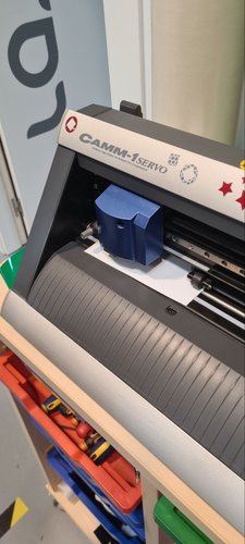The Roland GX-24 seen from the loading side with the bed clear.