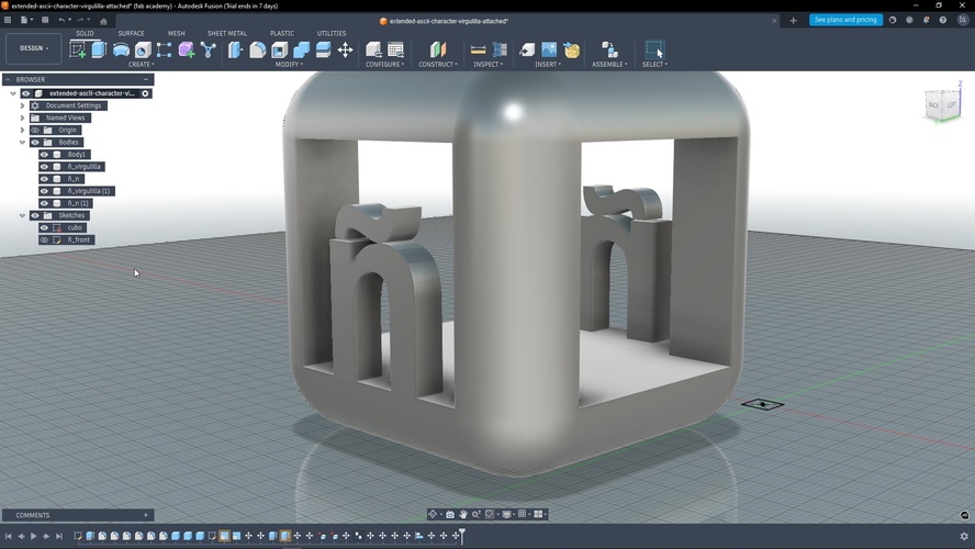Fusion 360 perspective view of the final cube with both ñ letters visible inside, all five bodies in the browser.