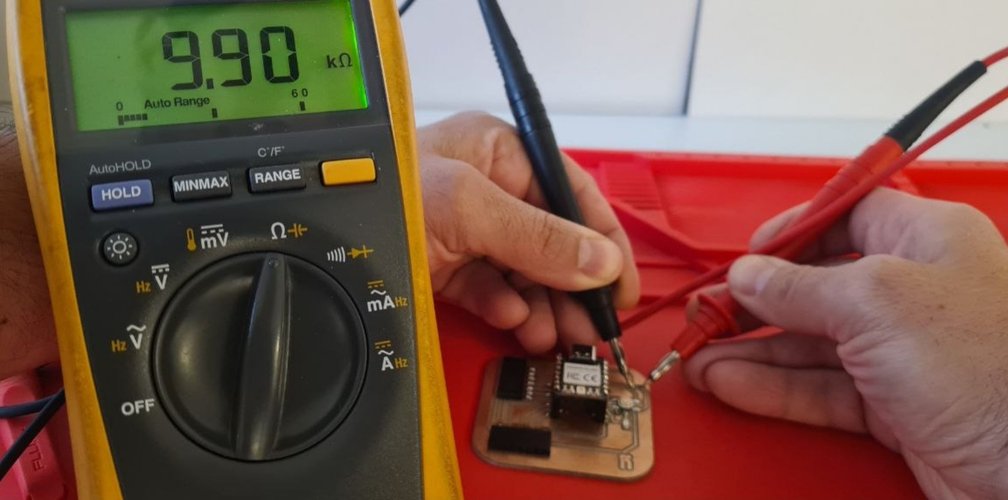 Fluke 179 in resistance mode reading 9.90 kiloohm across the pull-down resistor on the PCB.