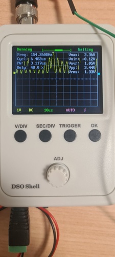 DSO Shell in Running mode showing SCL clock pulses with Freq 154 kHz, Vmax 3.36 V and Vpp 3.44 V.