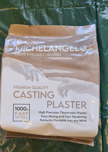 Front of the Algaplay Michelangelo Casting Plaster bag: 1000 g, fast setting, 'High Precision Thixotropic Plaster, Easy Mixing and Fast Hardening, Perfectly Pourable into any Mold'.
