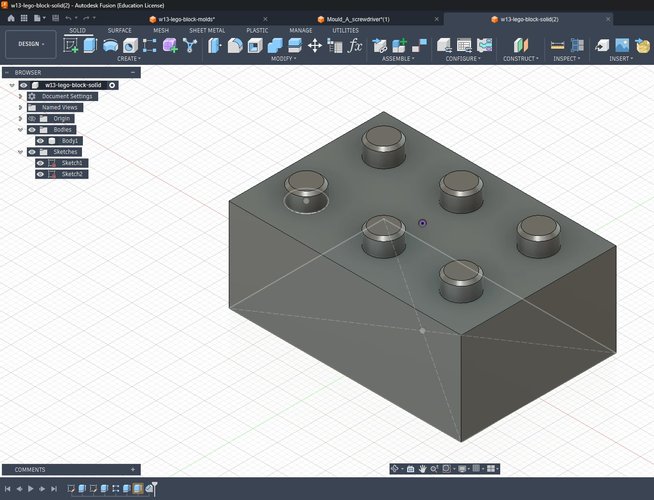Isometric view in Fusion 360 of the parametric EGO brick with six studs on the top face. The lower tubes that a real LEGO brick has on the underside are not present — they were removed to simplify the mold.