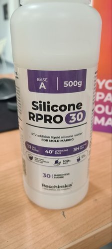 Close-up of the white Base A bottle of Reschimica RPRO 30, showing the label with mix ratio, working time and hardness specs