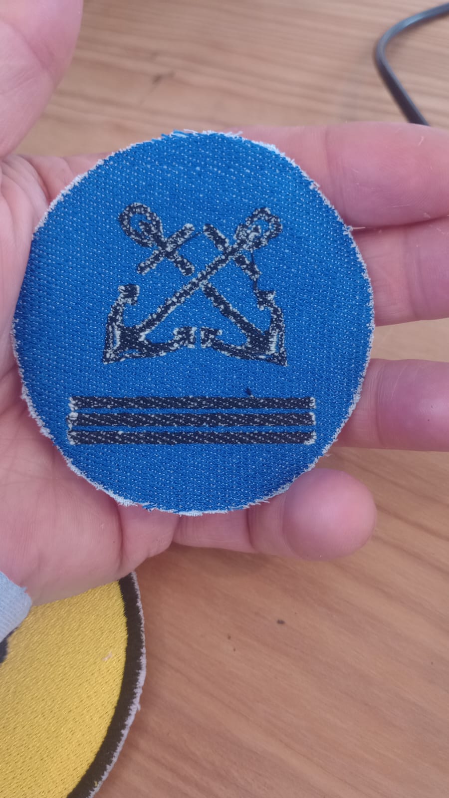Final embroidered captain symbol