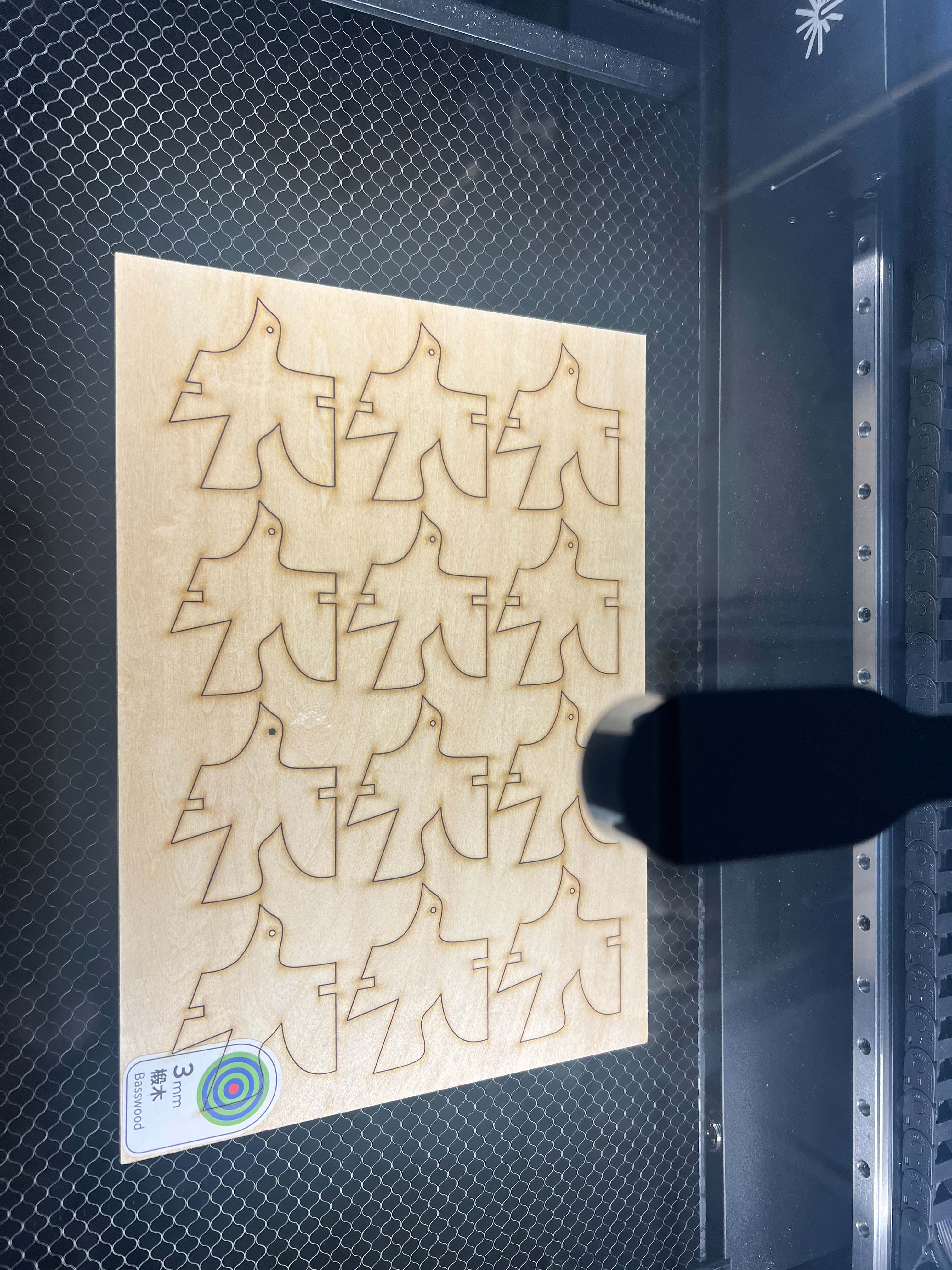 Bird shapes cut from plywood