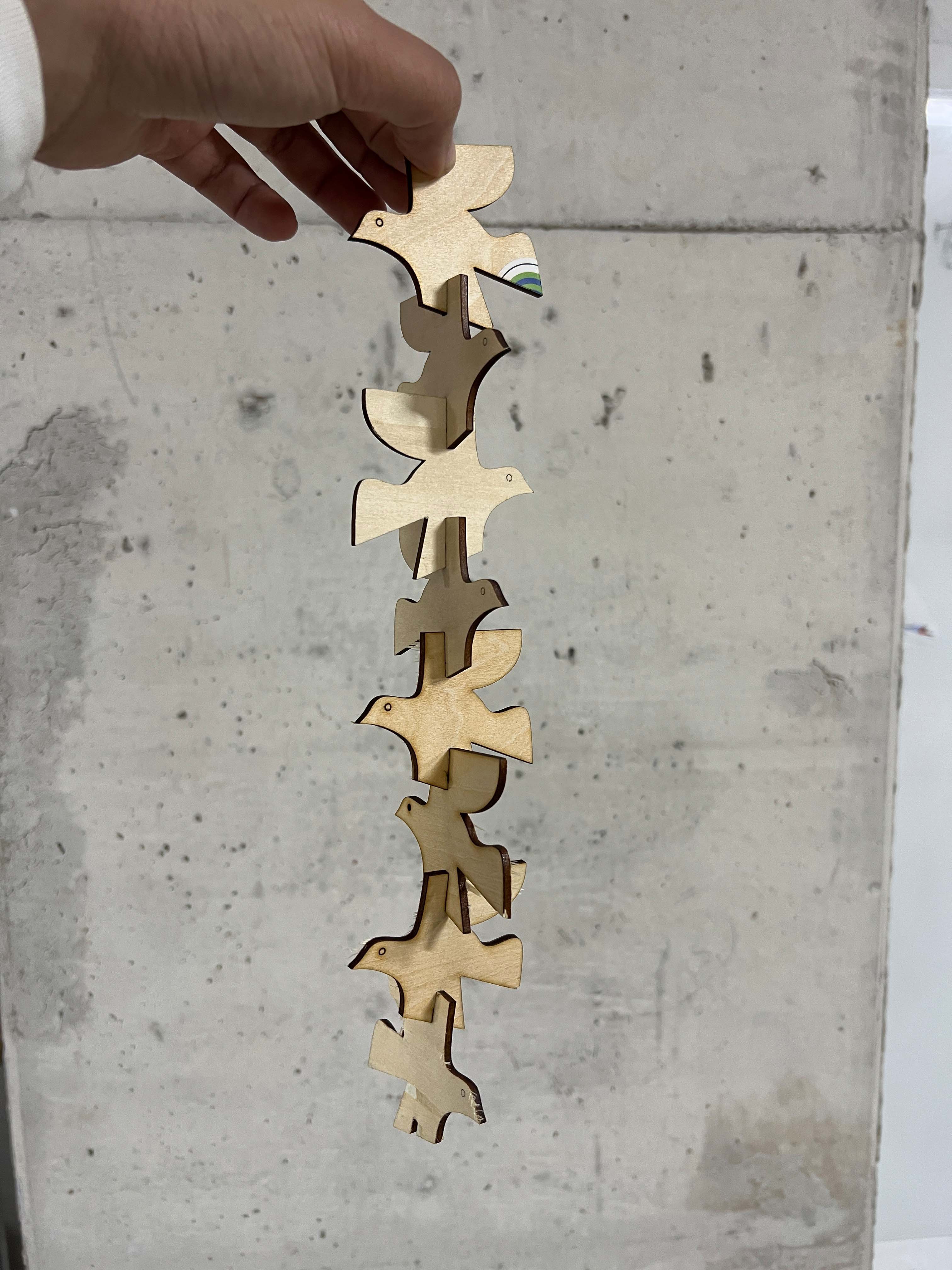 Vertical chain assembled with bird tiles
