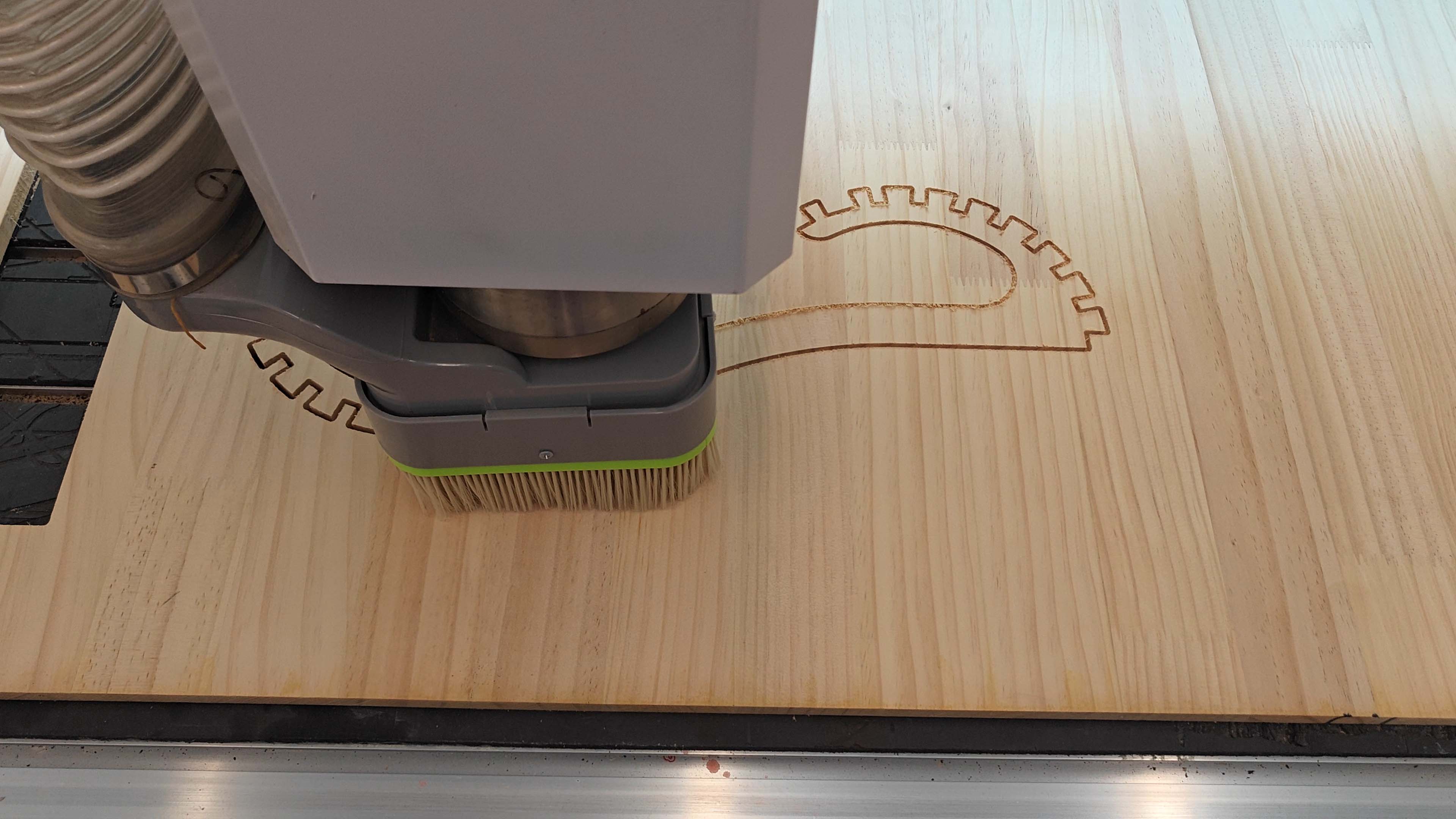 Close-up of CNC cutting curved component