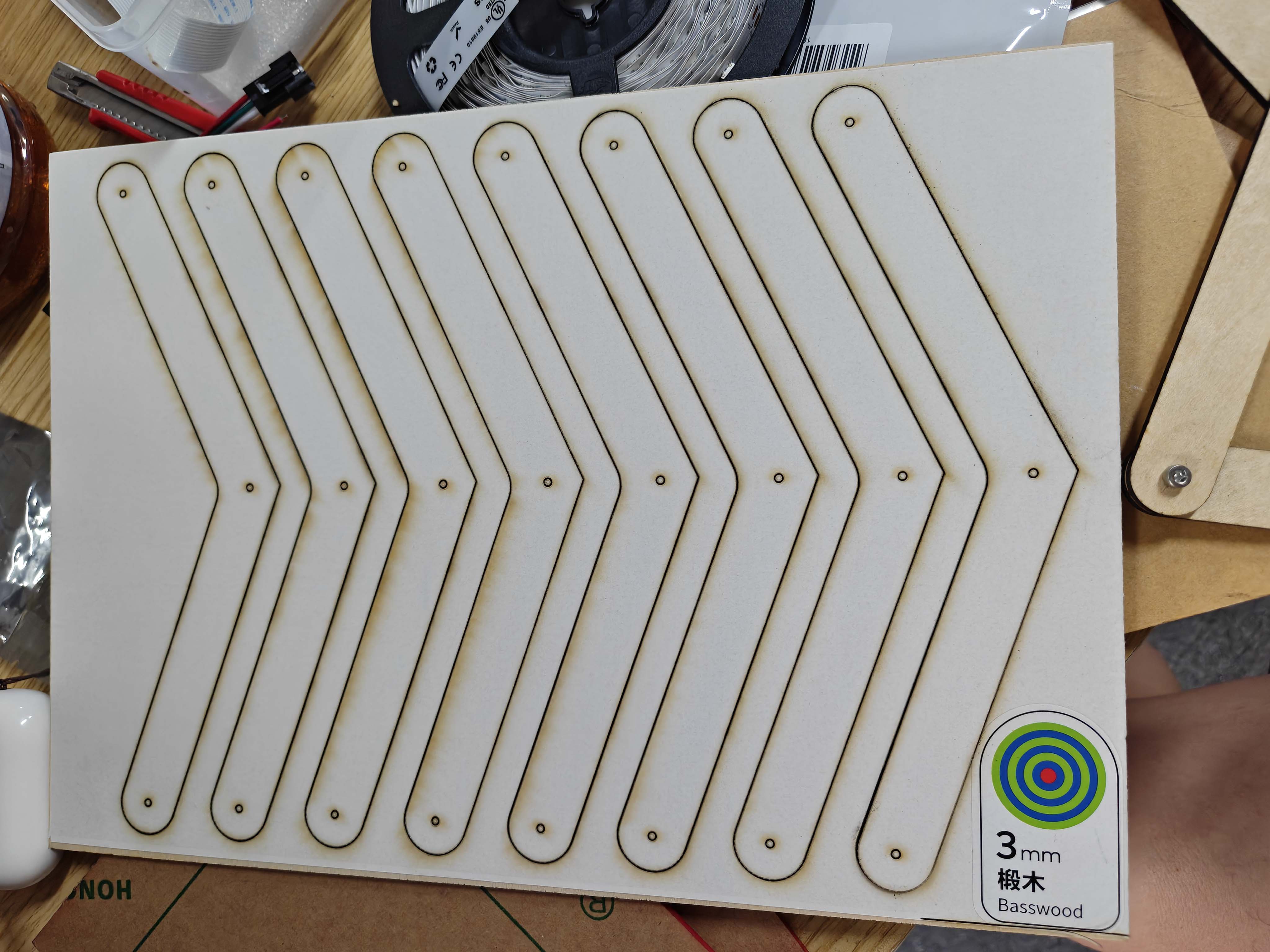 Laser-cut wooden linkage parts