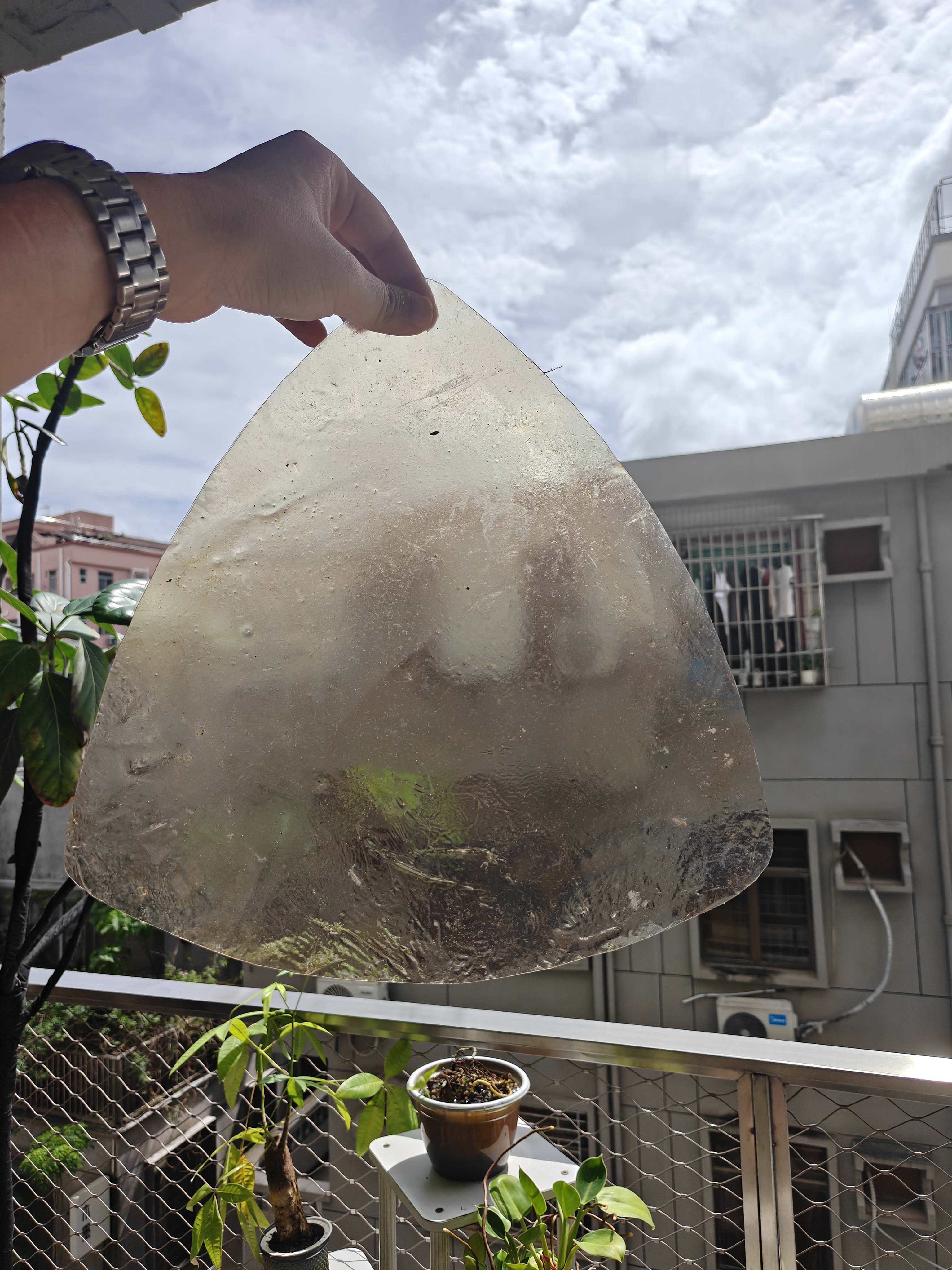 Clear translucent bio-material sheet tested against sunlight