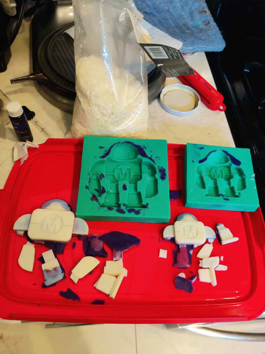 Both silicone molds with broken soap cast pieces from both attempts