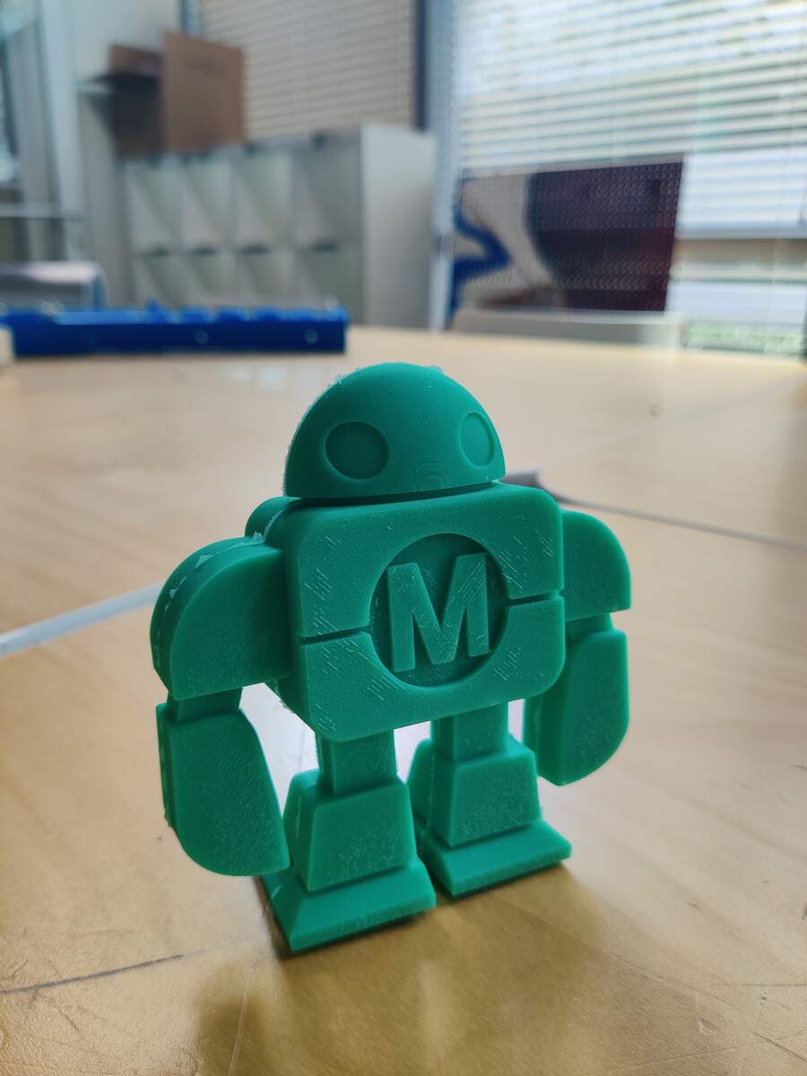 Green 3D printed Makey Robot front view