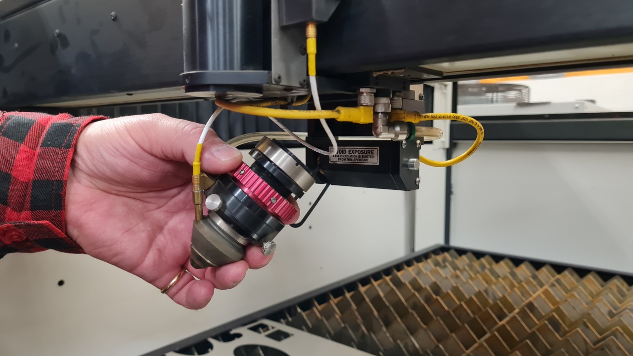 Laser head detached, showing magnet mount