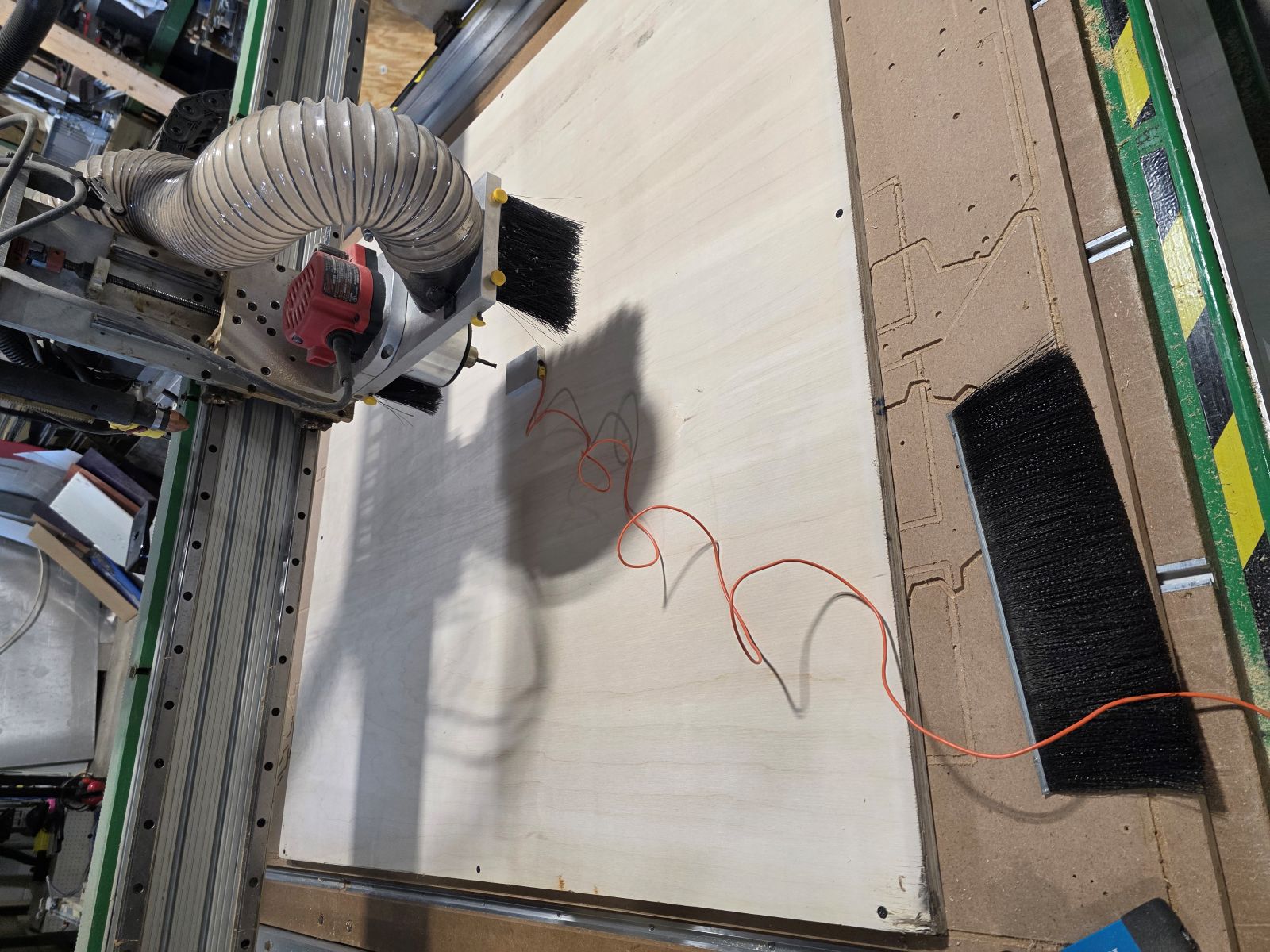 CNC bit touch sensor pad being used