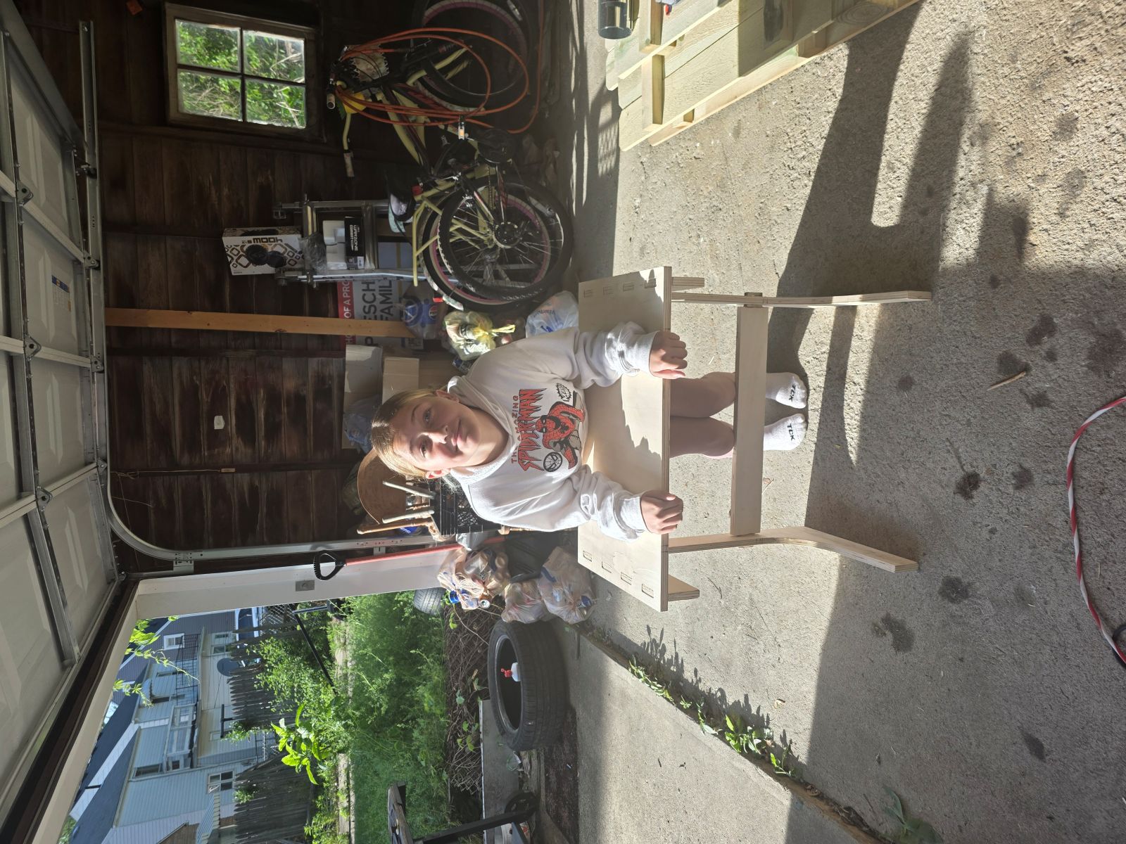 My daughter pushing on the table to test it