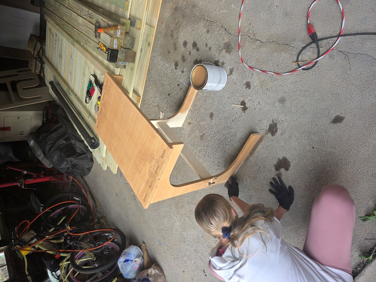 My daughter helping stain the table