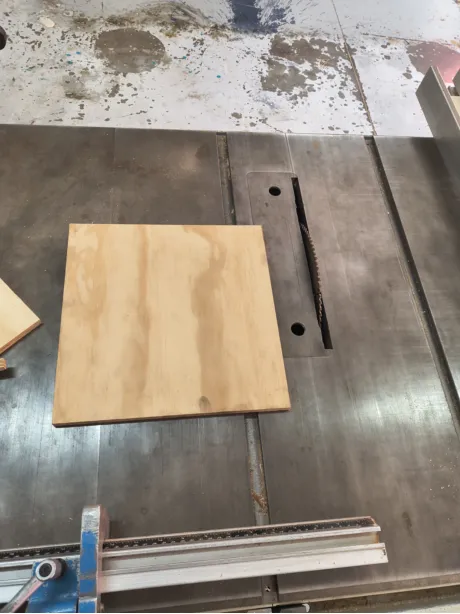 Table saw cutting plywood