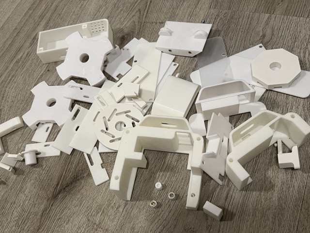 Collection of discarded 3D prints from the iterative housing development process