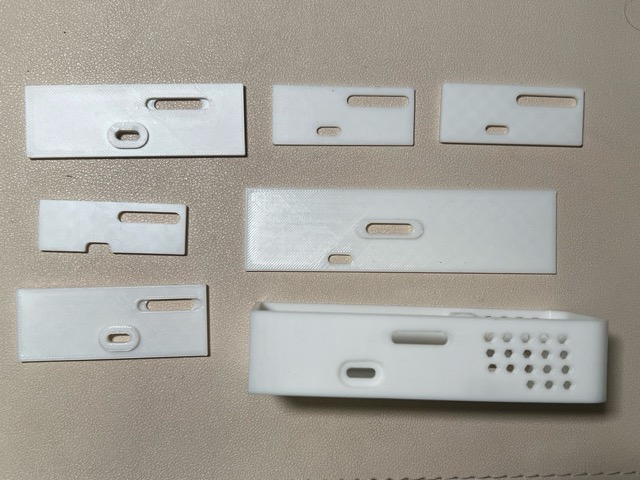 Multiple test prints used to find the correct pogo pin position and distance
