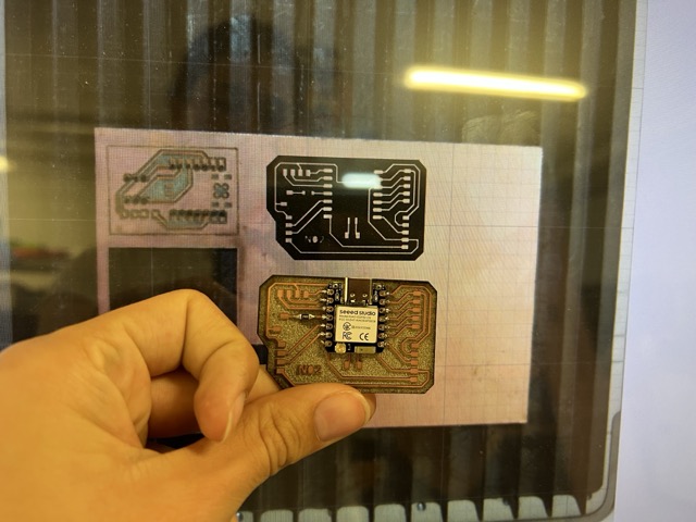 Assembled PCB with XIAO ESP32-C6, SMD components, and male pin headers soldered in place of the pogo pin pads