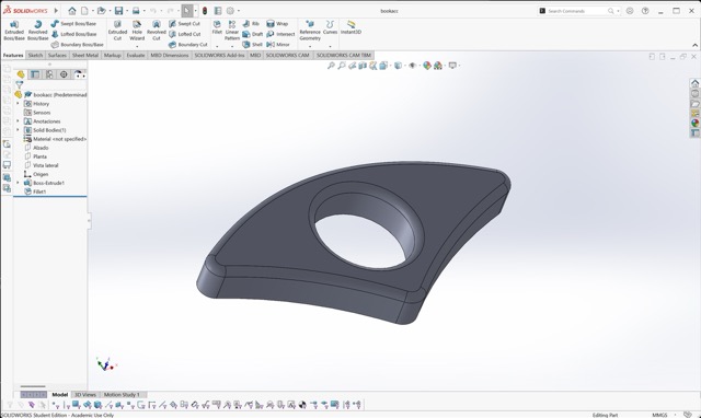 SolidWorks model after extrusion and fillet operations, alongside the 3D printed test piece for size verification