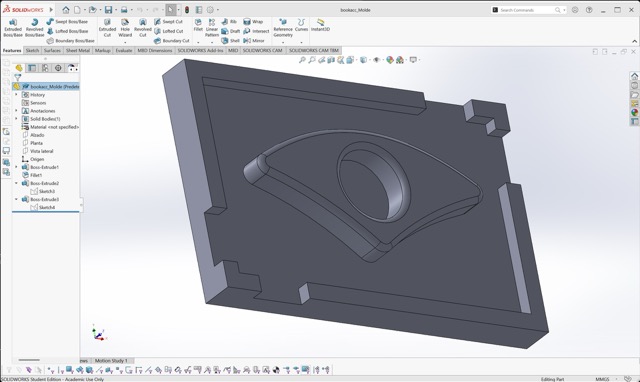 SolidWorks model of the three-part mold base showing the cavity geometry and alignment features