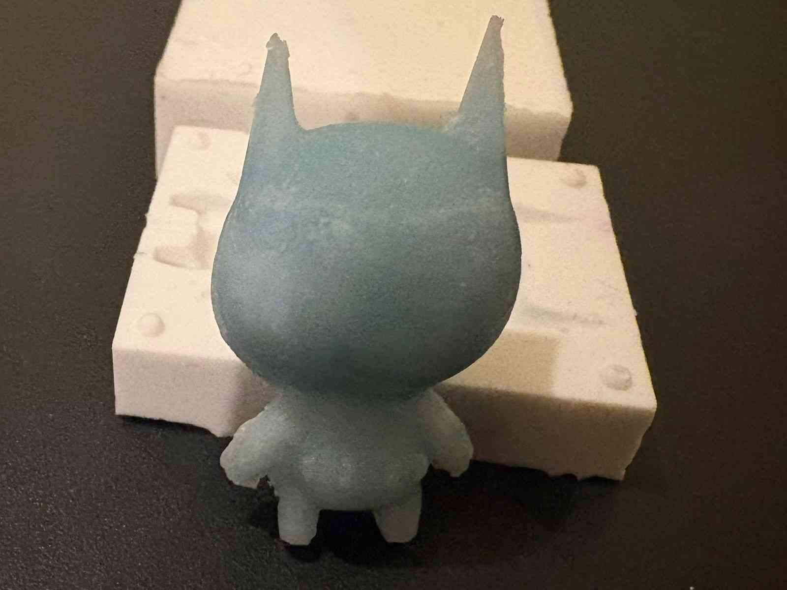 Pouring the liquid wax into the silicone mold
