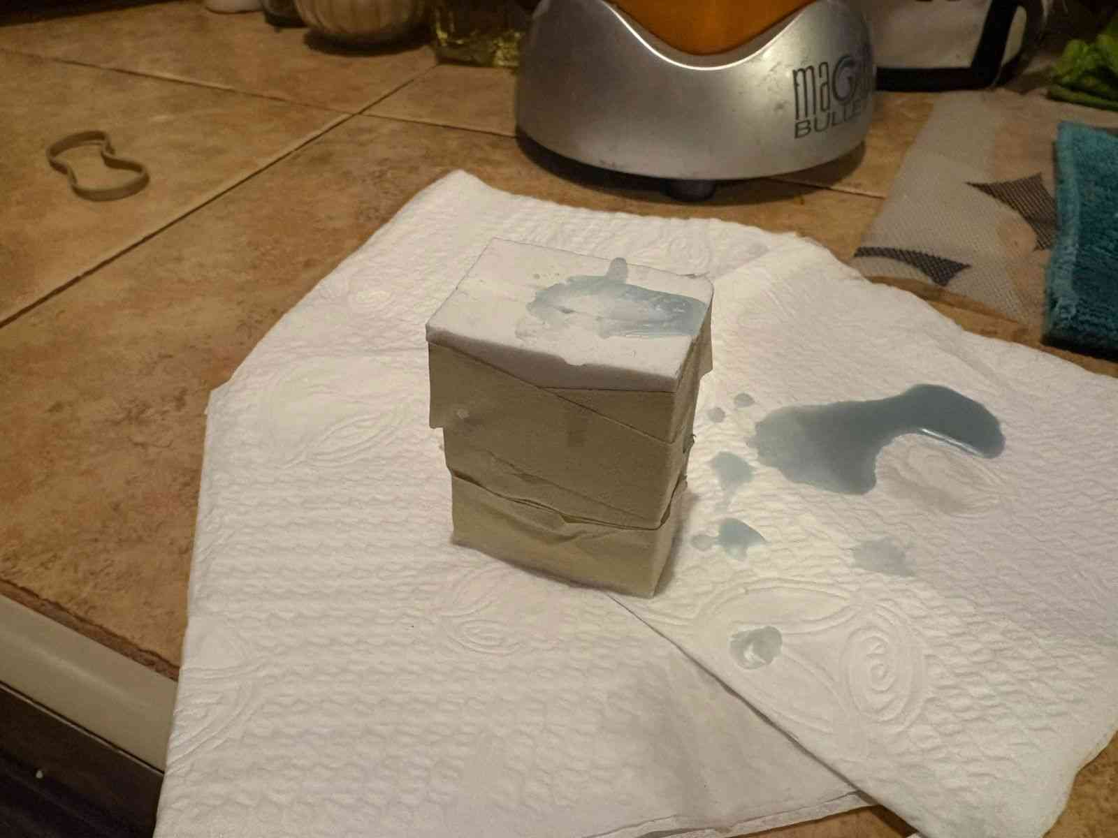 Pouring the liquid wax into the silicone mold