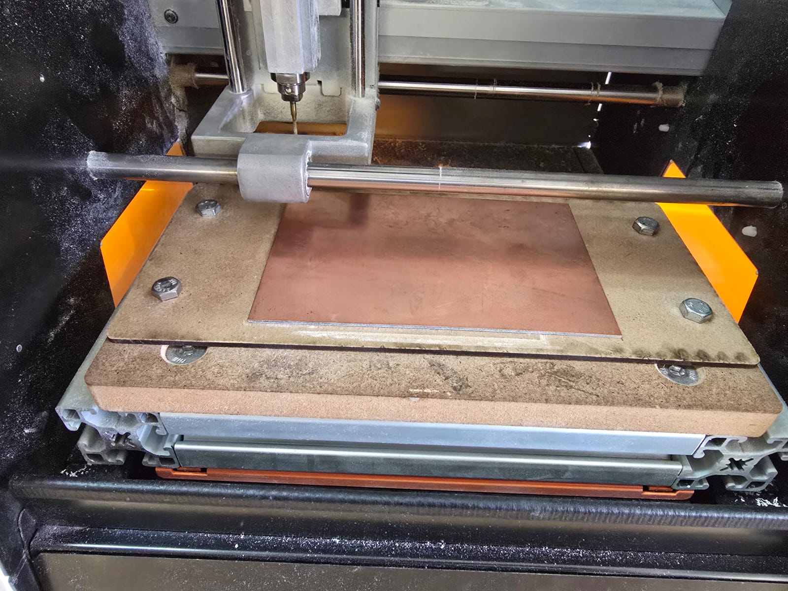 Fixing the copper board to the SRM-20 bed with double-sided tape