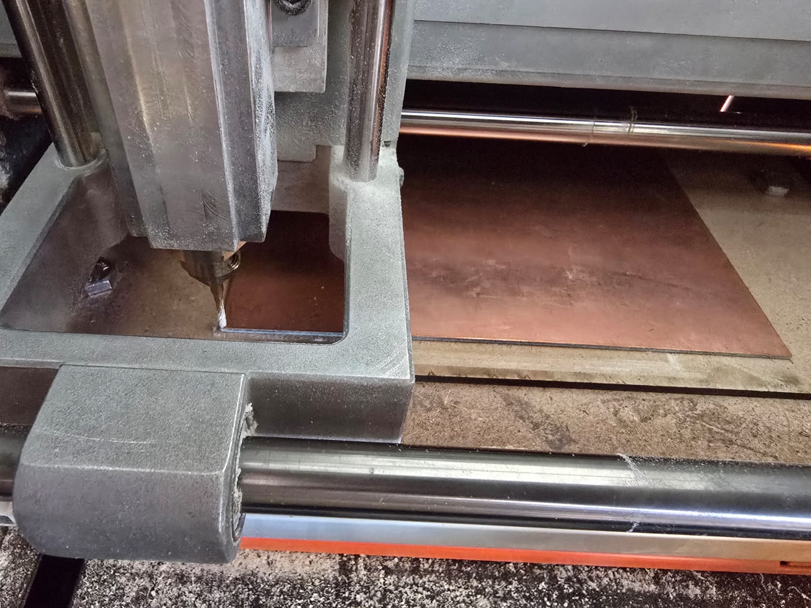 Setting the Z origin by dropping the end mill onto the copper surface