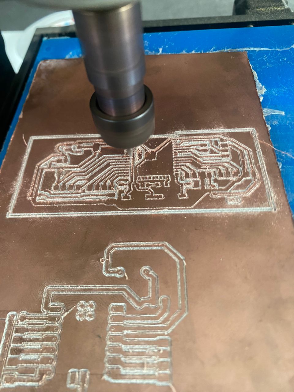 The CNC milling the copper PCB